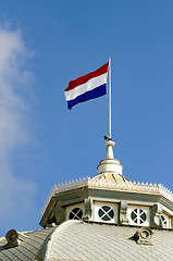 Image showing Dutch flag waving on the roof of Kurhaus hotel