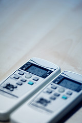 Image showing Two remote controllers of Air conditioners