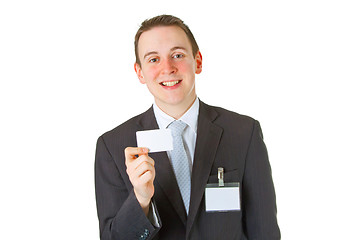 Image showing Smiley businessman showing business card