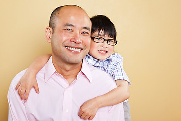 Image showing Asian father and son