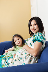 Image showing Pregnant Asian mother and her daughter