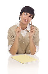 Image showing Daydreaming Hispanic Young Adult Female Student at Table