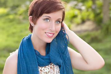 Image showing Pretty Blue Eyed Young Red Haired Adult Female Outdoor Portrait