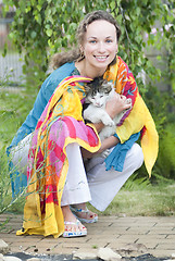 Image showing attractive woman with a cat