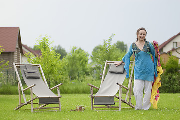 Image showing Young woman relaxing on nature