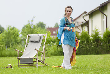 Image showing Cute woman relaxing on nature