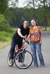 Image showing Happy couple at bicycle