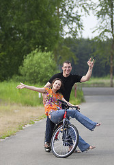 Image showing Happy couple at bicycle