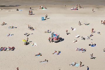 Image showing People relaxing on a beach