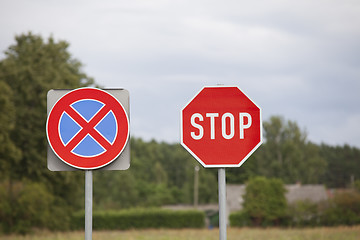 Image showing Stop sign and clearway sign on roadside