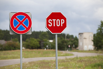 Image showing Stop sign and clearway sign on roadside