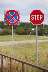 Image showing Stop sign and clearway sign on roadside