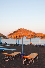 Image showing Sunbeds in Perissa, Santorini, Greece