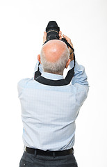 Image showing man with camera back view