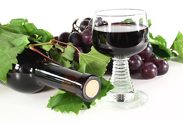 Image showing red wine with glass