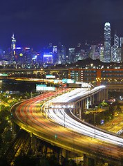 Image showing modern city and highway at night