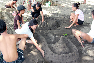 Image showing playing at the beach