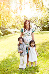 Image showing Pregnant Asian mother and her kids