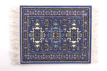 Image showing Persian Rug 1, a miniature Oriental rug. (isolated, 12MP camera)