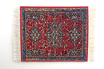 Image showing Persian Rug 4, a miniature Oriental rug. (isolated, 12MP camera)