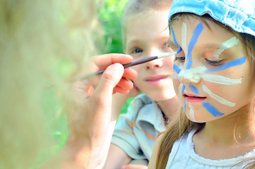 Image showing face mask cjild carnival painting