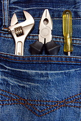 Image showing tools and jeans