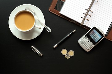 Image showing coffee pen phone and paper