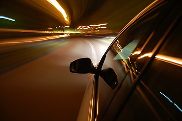 Image showing night drive with car in motion 