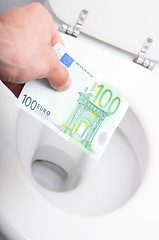 Image showing money and toilet