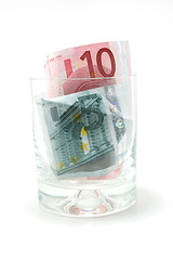 Image showing Money in glass