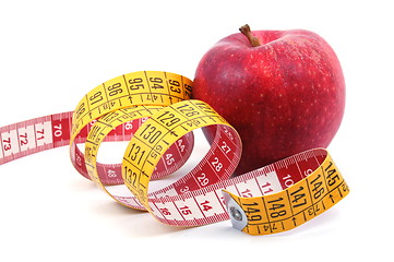 Image showing Apple and measuring tape on white