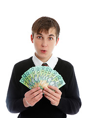 Image showing Student or young worker holding money