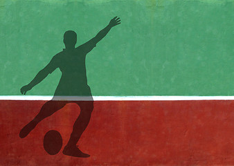 Image showing Not Quite Tennis - Rugby Player Silhouette Against Practice Wall