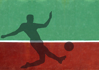 Image showing Not Quite Tennis - Soccer Player Silhouette Against Practice Wal