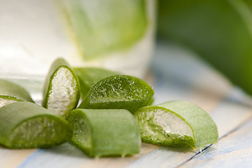 Image showing aloe vera juice with fresh leaves