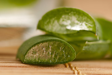 Image showing aloe vera juice with fresh leaves