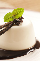 Image showing Panna Cotta with chocolate and vanilla beans