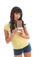 Image showing Attractive girl loving chocolate