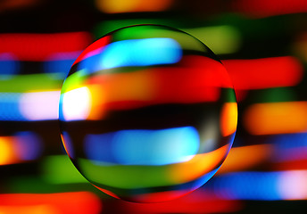 Image showing abstract colorful background with a transparent sphere