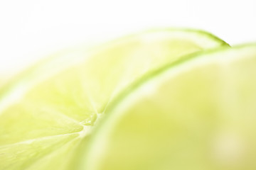 Image showing Slices of lime fruit on white