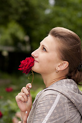 Image showing girl with a rose