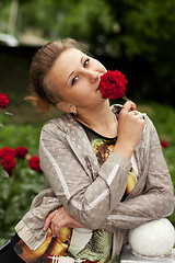 Image showing girl with a rose