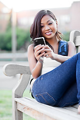 Image showing Asian student texting