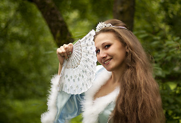 Image showing Snow Maiden with a fan