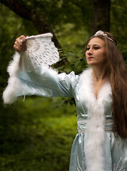 Image showing Snow Maiden with a fan
