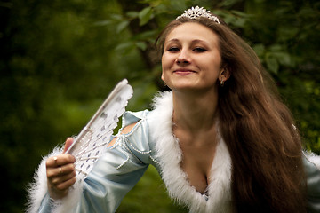 Image showing Snow Maiden with a fan