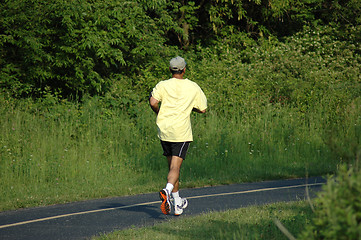 Image showing Lone jogger