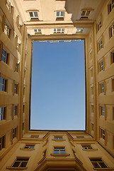 Image showing Blue sky framed by building