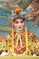 Image showing chinese opera dummy and red cloth as text space ,it is a toy,not