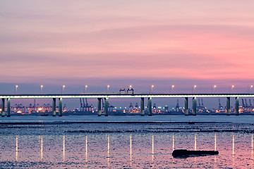 Image showing sunset in hongkong and highway bridge and container pier